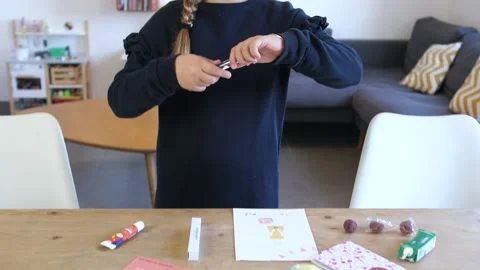 From bottom to top shot of cute happy young girl taking Parfum and Video stock 219983917