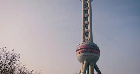 Bottom to top wide view of Oriental Pearl TV Tower in Shanghai Stock Footage 160426957