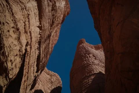 Bottom-up view to Abstract Rock formation at plateau Ennedi aka stone forest  Stock Photos