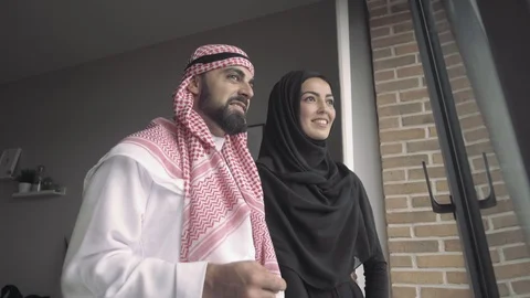 Bottom view An Arab man and his beautiful wife in traditional dress Stock Footage 113748853