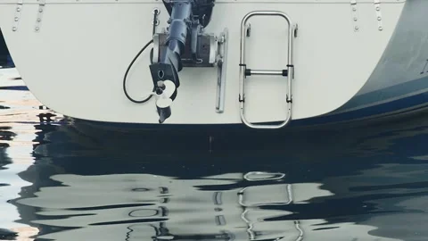 Bottom view of the back of a boat with outboard motor Vídeos de archivo 258812579