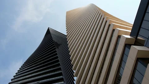 Bottom view of a beautiful few modern high-rise office buildings side by side Stock Footage 236910519