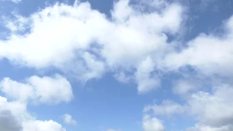 Bottom up view of blue sky with shining sun. Video stock 290065746