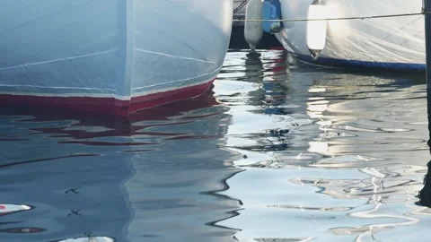 Bottom view of the bow of a large boat in the harbor 스톡 동영상 258812589