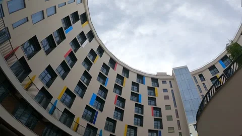 Bottom view circle shaped building with blue sky view in center. Sochi, Russia Stock Footage 321106234