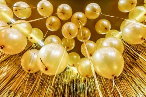 Bottom view Close up and abstract of vintage gold balloons for background Foto stock