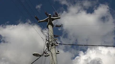 Bottom view on a concrete electric pole against the sky Video stock 297607093