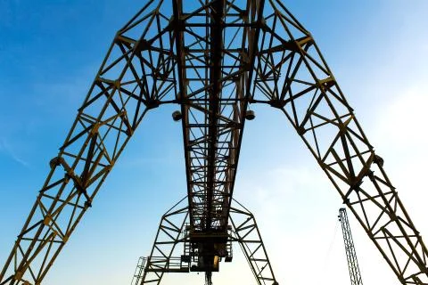 Bottom view of the construction of an overhead crane. Heavy industry concept Stock Photos