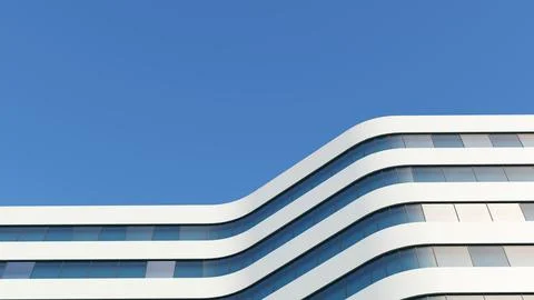Bottom view of the curve wall building Ilustración de archivo