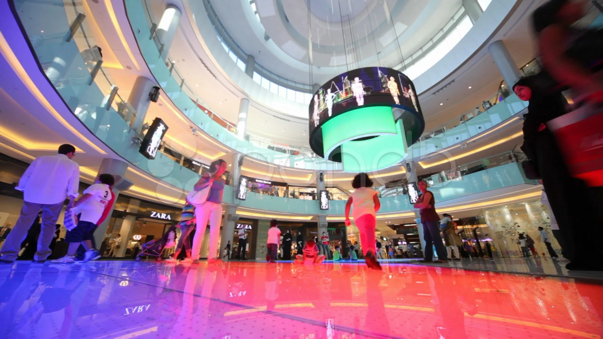 Bottom View On Dubai Mall With Visitors Inside In Dubai Uae