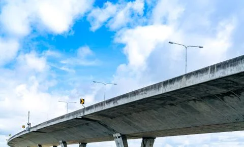 Bottom view of elevated concrete highway. Overpass concrete road. Road flyove 库存照片