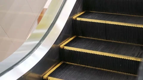 Bottom view of empty escalator steps going up in the mall 動画素材 160748283