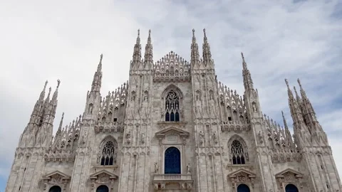 Bottom view of famous, iconic and historical church called Duomo in Milan. Video stock 299716061