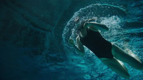 Bottom view of a female swimmer Stock Footage 283137883