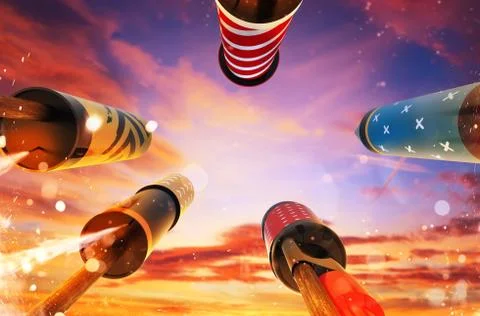 Bottom view of fireworks rockets launching into the sky Stock Photos
