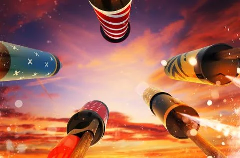 Bottom view of fireworks rockets launching into the sky Stock Photos