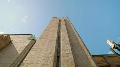 Bottom view of a high stone tower Stock Photos