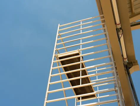 Bottom view of a high tower of scaffolding installed for equipment maintenance Stock-Fotos