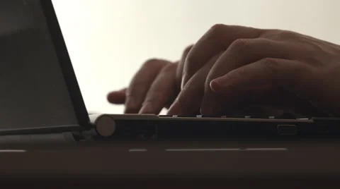 BOTTOM VIEW: A human hands typing on a notebook Vídeo Stock 66786615