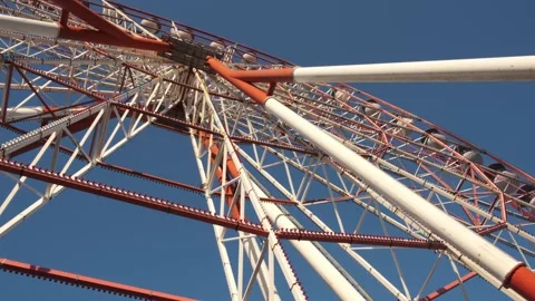 Bottom view of a large Ferris wheel attraction Stock Footage 252067408