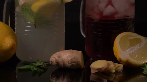 Bottom View Lemonade and carbonated water in Jar Panning with Ginger and Lemon 스톡 동영상 130908891
