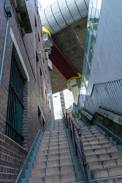 Bottom up view from lower ground stairs to the bridge above, Western Distributor Fotos de archivo
