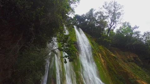 Bottom view of the magnificent waterfall falling Stock Footage 73210478
