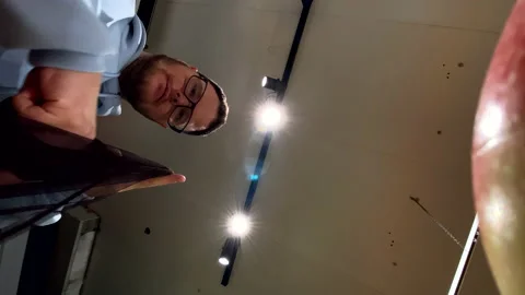 Bottom view man choosing apples at groceries store Stock Footage 219311749