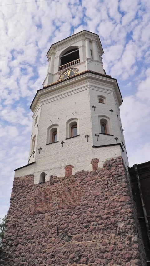 Bottom view of a medieval clock tower in heart of Vyborg old town. Видео 234882582