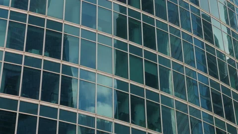 Bottom up view of modern building with mirrored windows Video stock 192891162