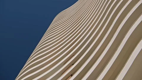 Bottom view of modern office building against the sky. Building exterior Stock Footage 305422821