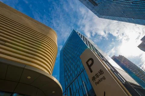 Bottom view of modern skyscraper. Business district Stock Photos