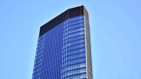 Bottom view of modern skyscraper Stock Photos