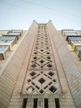 Bottom-up view of a multi-storey residential, prefabricated panel house. Stock Photos