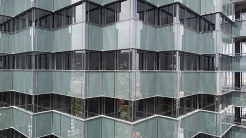 Bottom view of office building window close up, reflection and perspective. 스톡 동영상 244816633