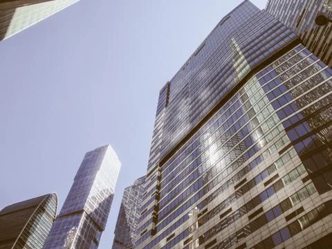 Bottom view of office building window in big city Stock Photos