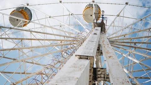 Bottom view of the old Ferris wheel in the amusement Park. Bottom-up view Stock Footage 110943514