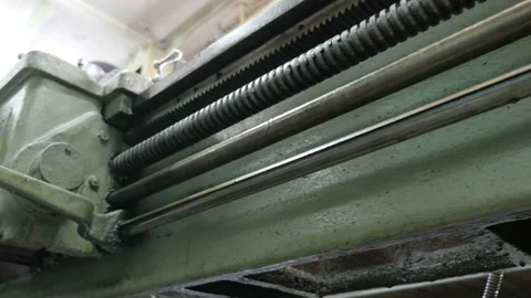 Bottom view of old lathe machine in the turning workshop Stock Footage 87467808