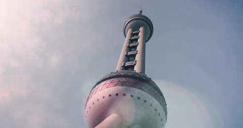 Bottom view of Oriental Pearl Tower in Shanghai in a suunny day Stock Footage 160327759