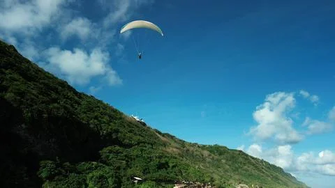 Bottom view of a pair of glider pilots flying on a paraglider, instructor. Fotos Stock
