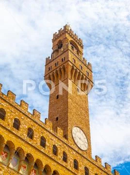 Bottom view of Pallazo Vecchio, Old Palace - Town Hall, with high bell tower Stock Photos