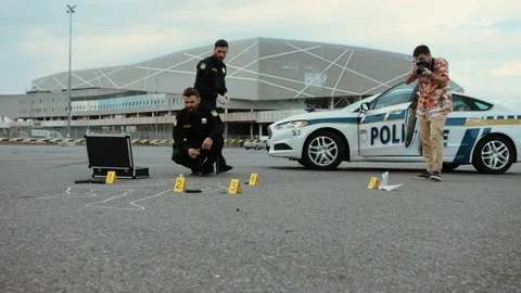 Bottom view policeman and forensic scientist examining evidence after dreadful Stock Footage 112982217