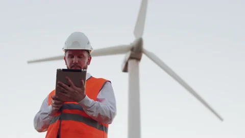 Bottom view of a portrait of an engineer with a beard with a modern tablet Stock Footage 137626884