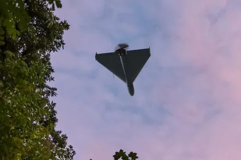 Bottom view of Russian army drone combat drone "Shahid" in the sky against folia 스톡 사진
