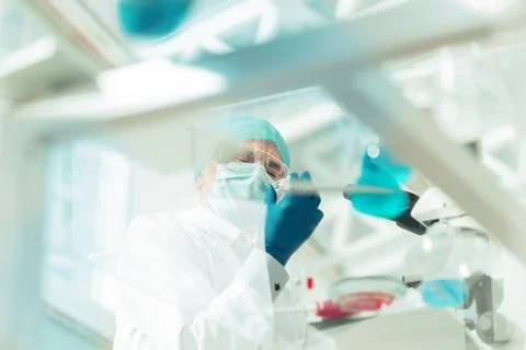 Bottom view. scientist pharmacist sitting at a laboratory table . Stock Photos