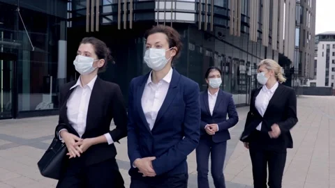 Bottom view serious middle aged business colleagues talking outdoors Group of Stock Footage 135825173