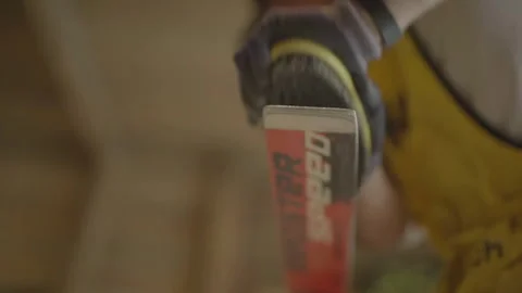 Bottom view of ski being brushed Video stock 345804613