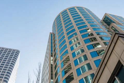Bottom view of a skyscraper in Seattle on a clear day. Stock Photos