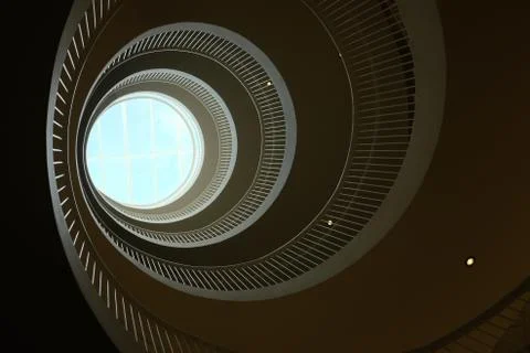 Bottom view of a spiral staircase Stock Photos