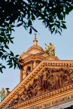 Bottom view on St. Isaac Cathedral at sunset under clouds in Saint-Petersburg 스톡 사진